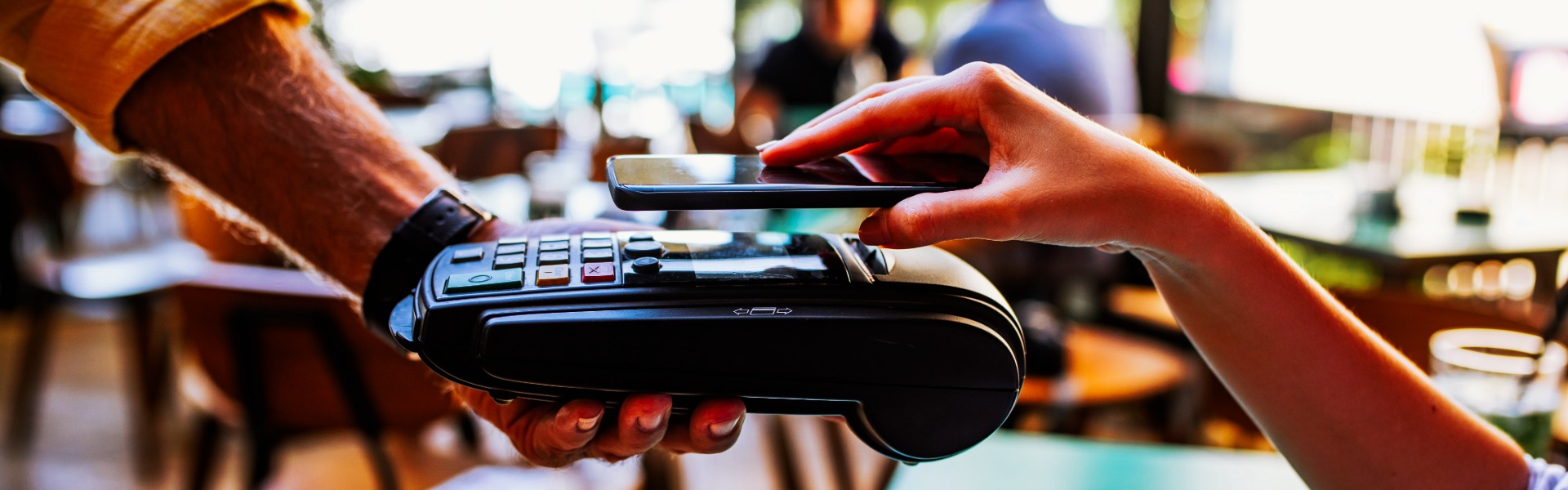 Person using a mobile device for digital banking